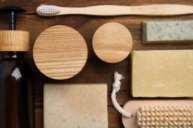 Eco friendly personal care products on wooden table, flat lay Photo of Eco friendly personal care products on wooden table, flat lay
