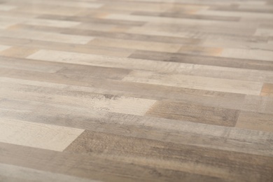 Clean wooden laminate as background. Floor covering Photo of Clean wooden laminate as background. Floor covering