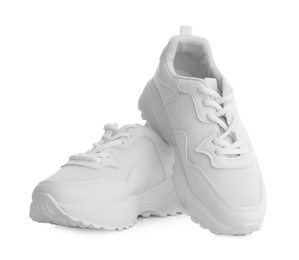 Stylish sneakers on white background. Trendy footwear Photo of Stylish sneakers on white background. Trendy footwear