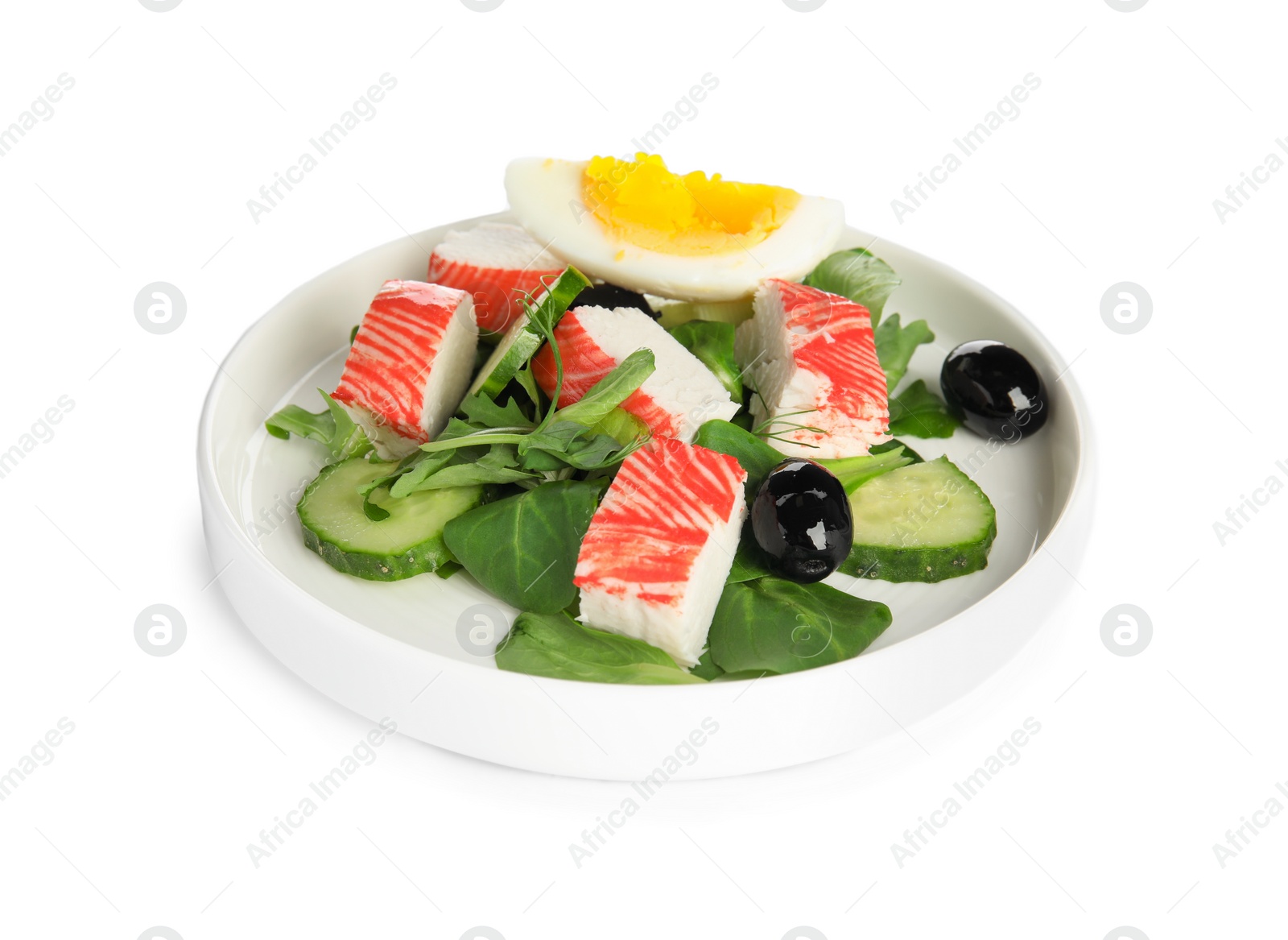 Delicious crab stick salad isolated on white Photo of Delicious crab stick salad isolated on white