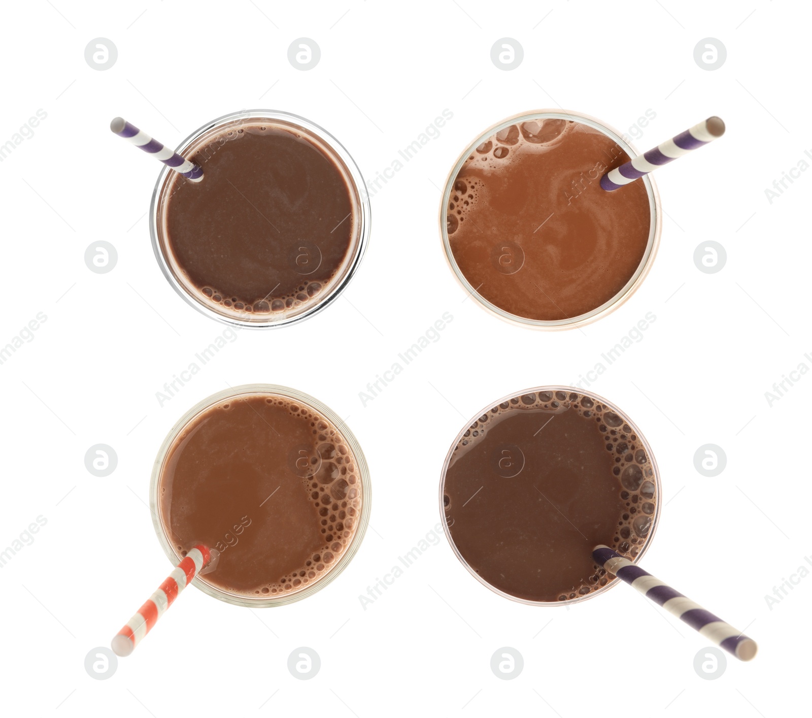 Image of Set with delicious chocolate milk on white background, top view