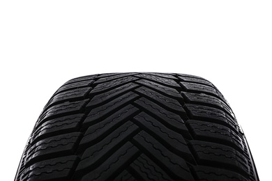 Winter tire on white background, closeup. Car maintenance Photo of Winter tire on white background, closeup. Car maintenance