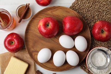 Traditional English apple pie ingredients on white wooden table, flat lay Photo of Traditional English apple pie ingredients on white wooden table, flat lay