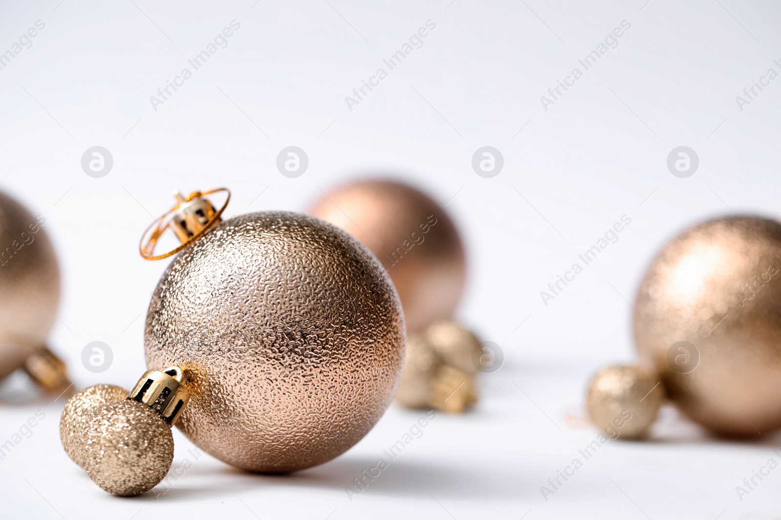 Photo of Many beautiful Christmas balls on white background