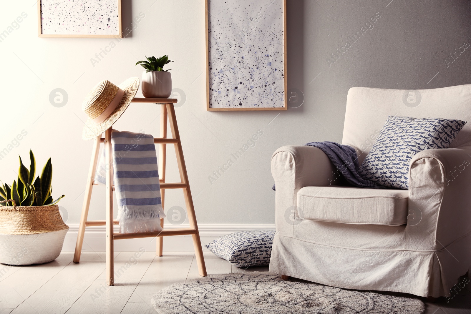 Beautiful room interior with stylish wooden ladder Photo of Beautiful room interior with stylish wooden ladder
