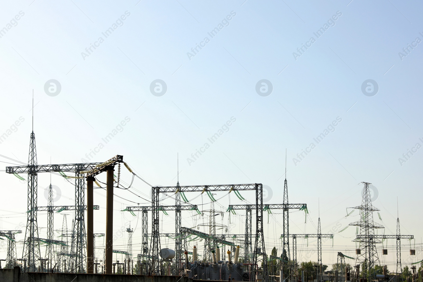 Modern electrical substation outdoors on sunny day Photo of Modern electrical substation outdoors on sunny day