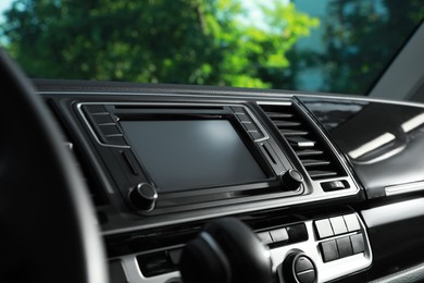 Photo of View of dashboard with navigation system in modern car
