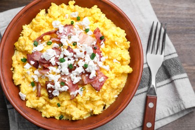 Tasty banosh served with brynza and pork cracklings on wooden table, flat lay. Traditional Ukrainian dish Photo of Tasty banosh served with brynza and pork cracklings on wooden table, flat lay. Traditional Ukrainian dish