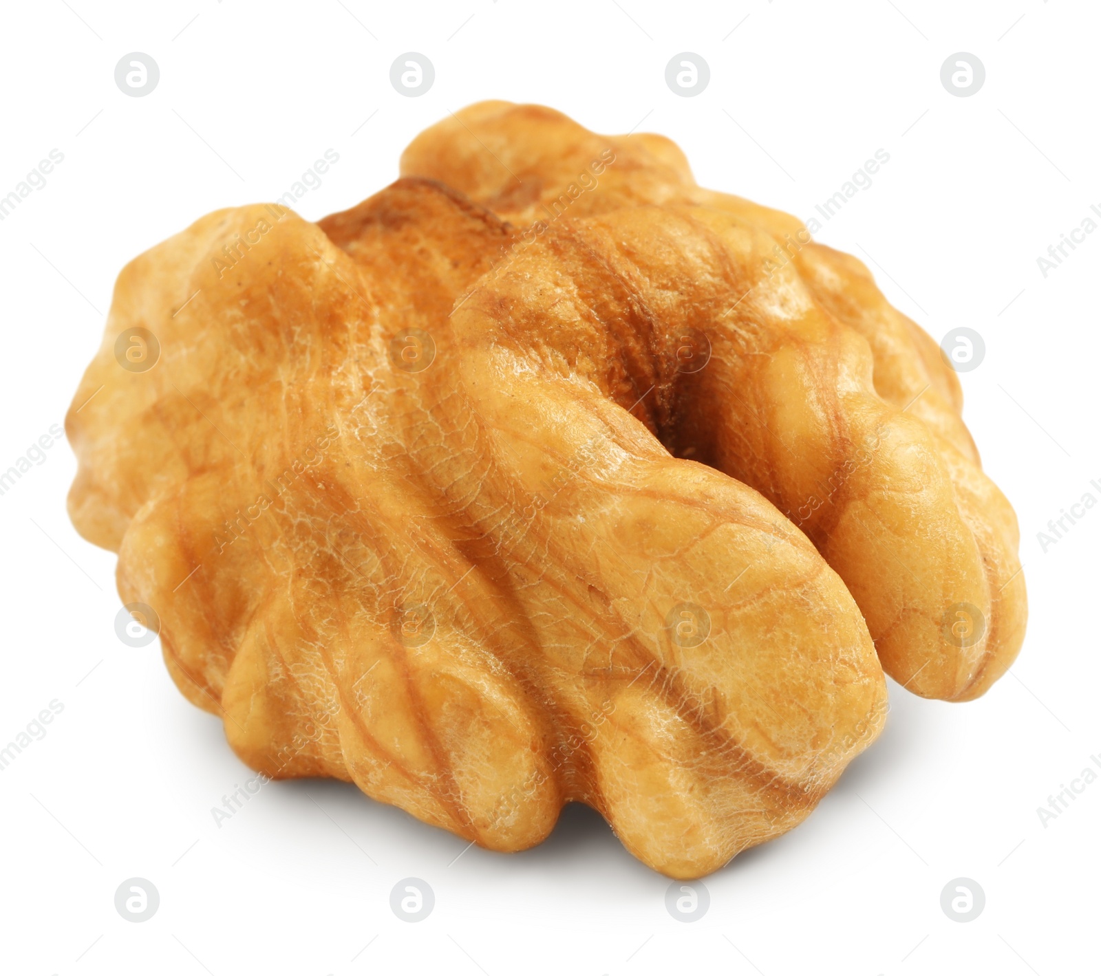 Half of ripe walnut isolated on white Photo of Half of ripe walnut isolated on white