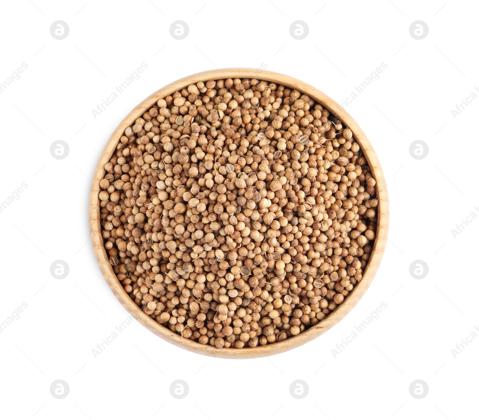 Dried coriander seeds in wooden bowl on white background, top view Photo of Dried coriander seeds in wooden bowl on white background, top view