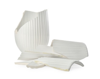 Broken bright ceramic vase isolated on white Photo of Broken bright ceramic vase isolated on white