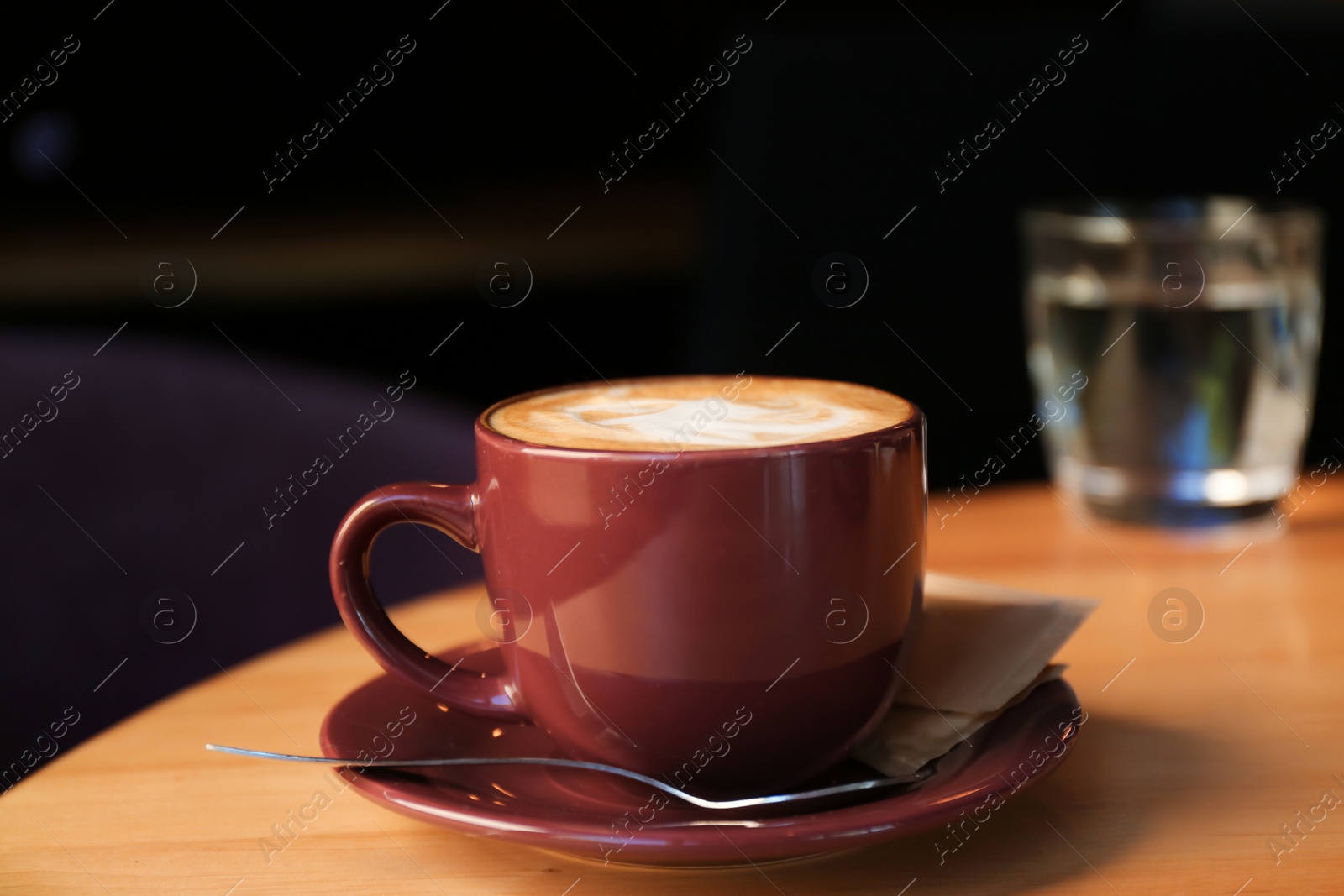 Aromatic coffee on wooden table in cafe Photo of Aromatic coffee on wooden table in cafe