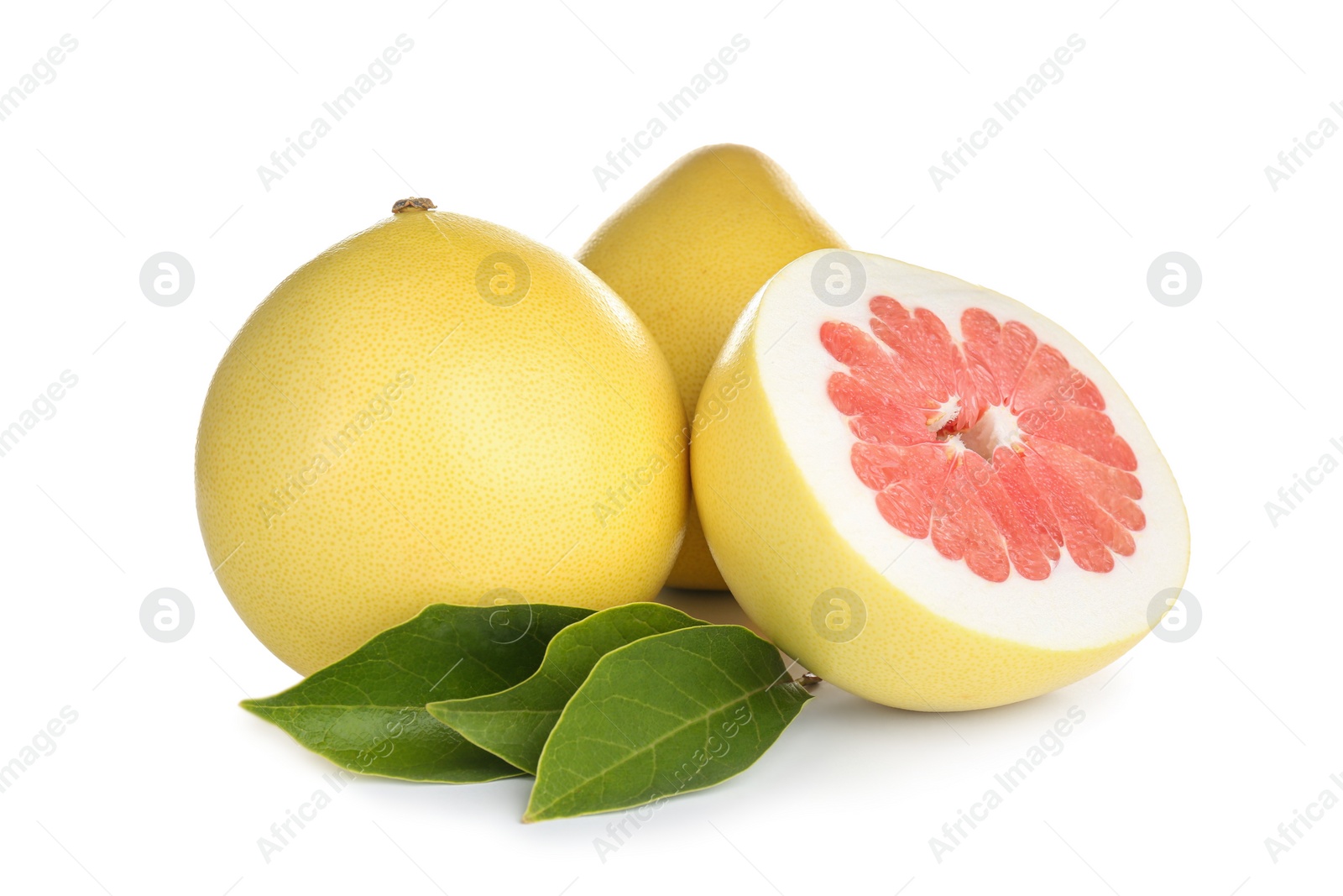 Photo of Fresh cut and whole pomelo fruits isolated on white