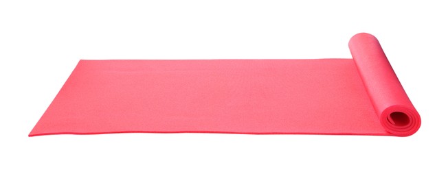 Bright pink camping mat isolated on white Photo of Bright pink camping mat isolated on white