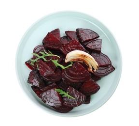 Plate with roasted beetroot slices, arugula and onion isolated on white, top view Photo of Plate with roasted beetroot slices, arugula and onion isolated on white, top view