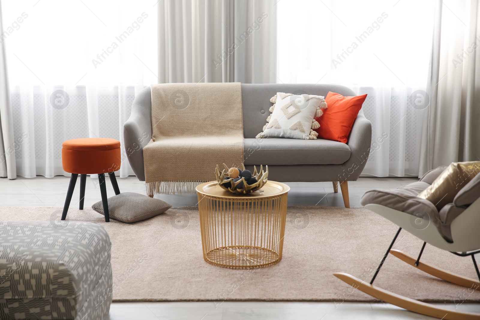 Cozy living room interior inspired by autumn colors Photo of Cozy living room interior inspired by autumn colors