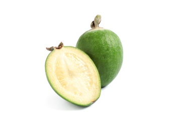 Cut and whole feijoas on white background Photo of Cut and whole feijoas on white background