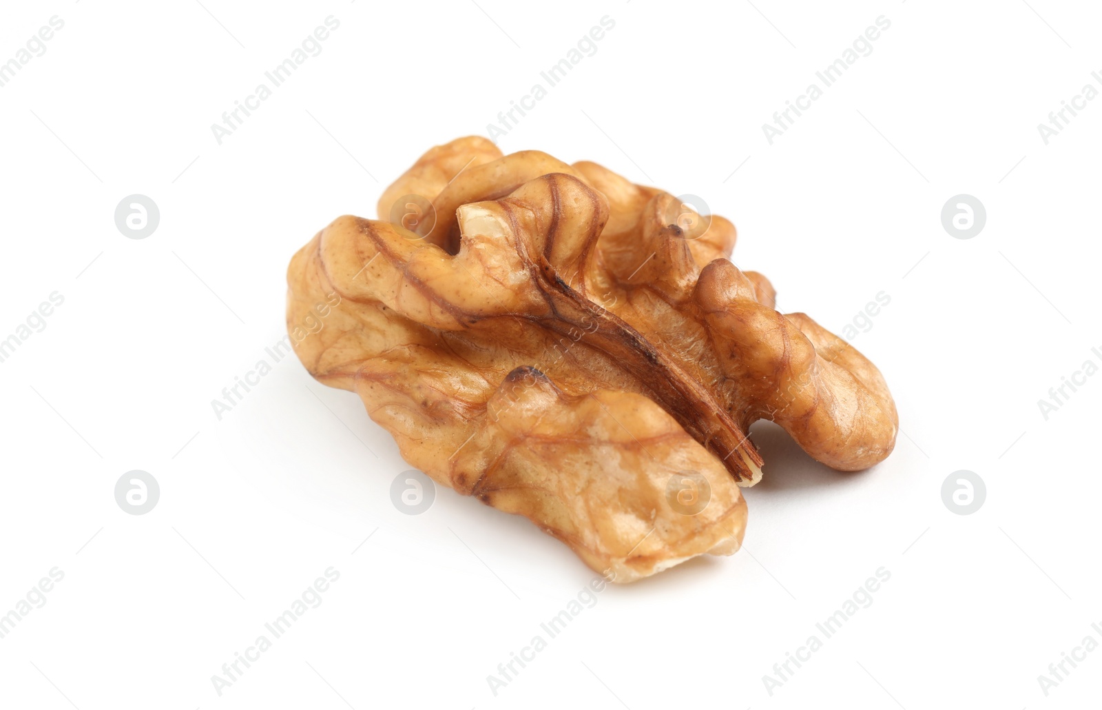Half of ripe walnut isolated on white Photo of Half of ripe walnut isolated on white