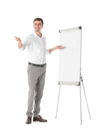 Photo of Business trainer giving presentation on flip chart board against white background