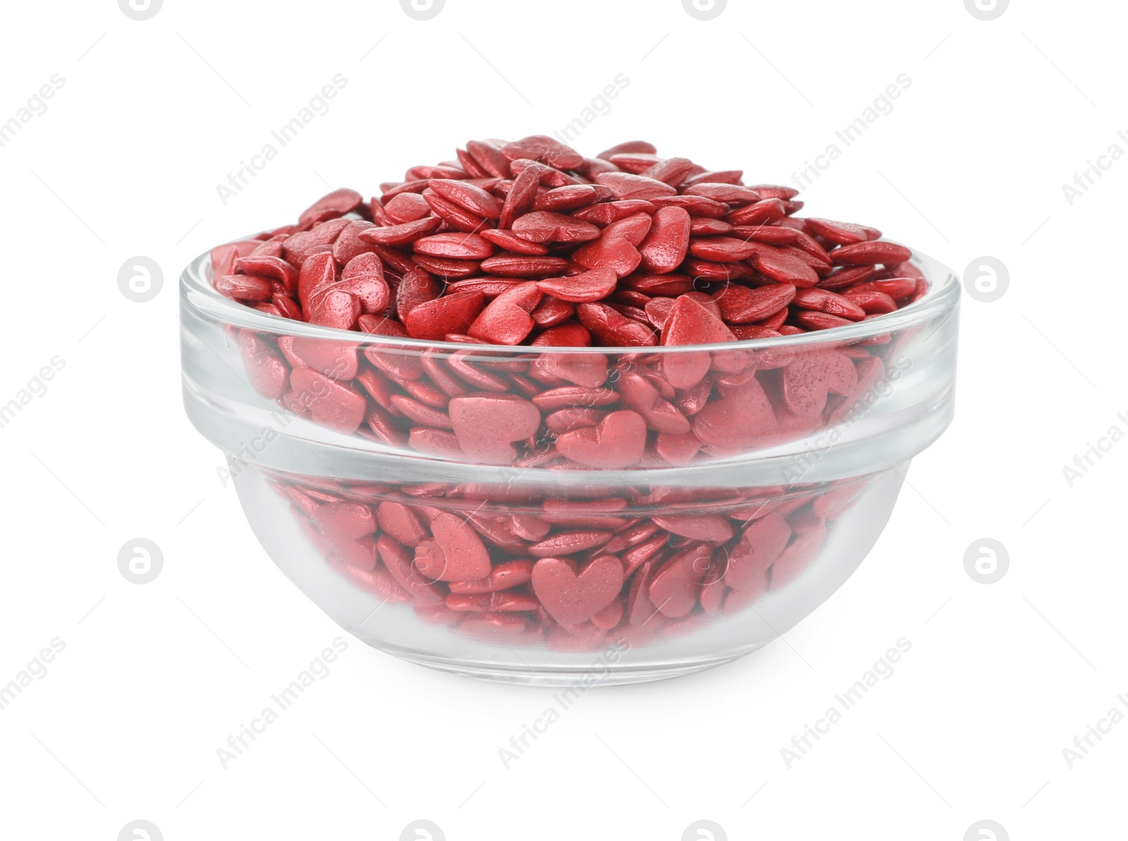 Bright heart shaped sprinkles in glass bowl isolated on white Photo of Bright heart shaped sprinkles in glass bowl isolated on white