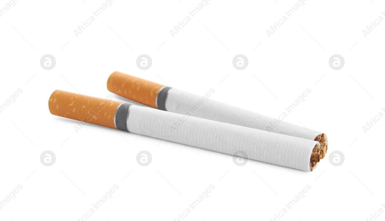 Cigarettes with orange filters isolated on white Photo of Cigarettes with orange filters isolated on white
