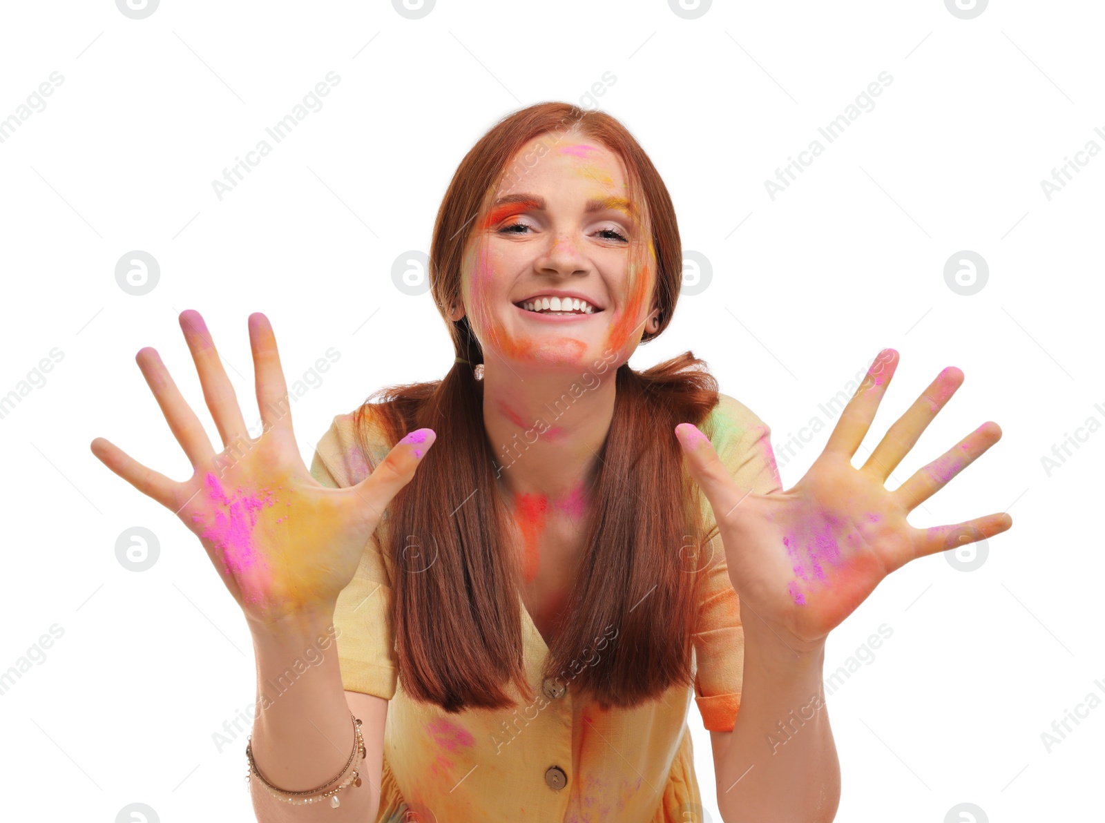 Woman covered with colorful powder dyes on white background. Holi festival celebration Photo of Woman covered with colorful powder dyes on white background. Holi festival celebration
