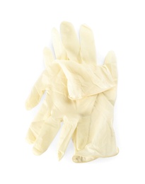 Pair of medical gloves isolated on white, top view Photo of Pair of medical gloves isolated on white, top view