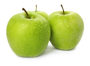 Fresh ripe green apples with water drops isolated on white Photo of Fresh ripe green apples with water drops isolated on white