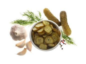 Photo of Tasty pickled cucumbers, garlic and dill on white background, top view