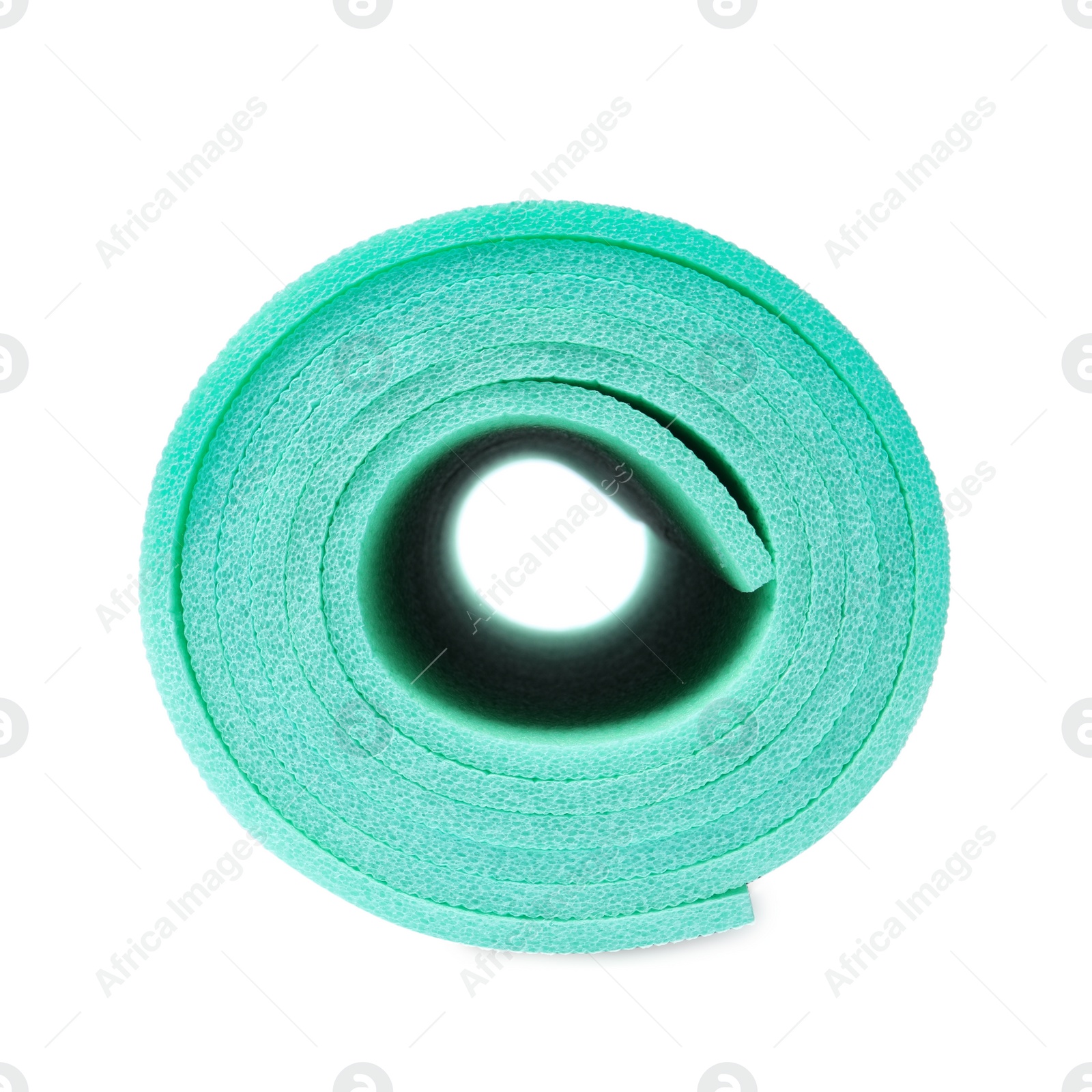 Rolled turquoise camping mat isolated on white Photo of Rolled turquoise camping mat isolated on white
