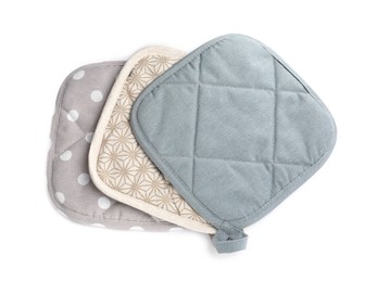 Photo of Oven potholders for hot dishes on white background, top view
