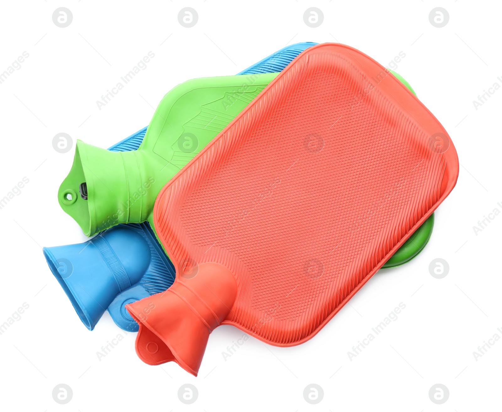 Rubber hot water bottles isolated on white, top view Photo of Rubber hot water bottles isolated on white, top view