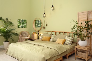 Stylish bedroom with modern furniture. Interior design Photo of Stylish bedroom with modern furniture. Interior design