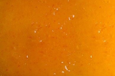 Sweet apricot jam as background, closeup view Image of Sweet apricot jam as background, closeup view