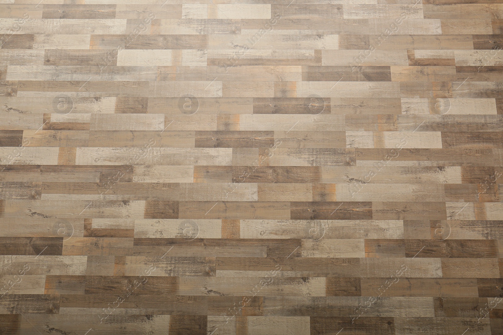 Wooden laminate as background, top view. Floor covering Photo of Wooden laminate as background, top view. Floor covering