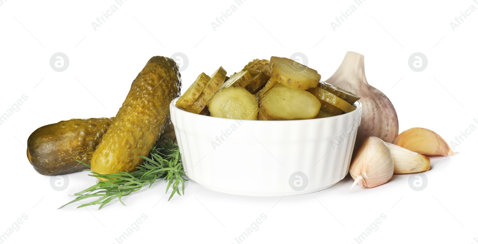 Tasty pickled cucumbers, garlic and dill on white background Photo of Tasty pickled cucumbers, garlic and dill on white background