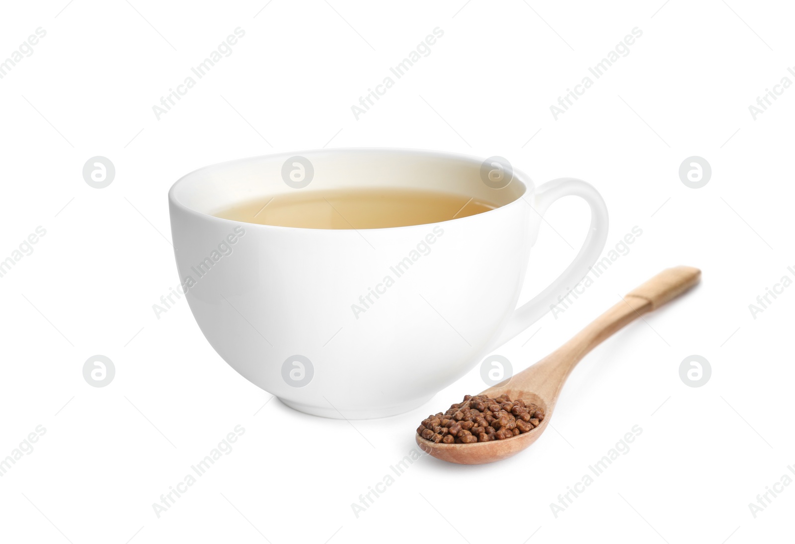 Buckwheat tea and granules on white background Photo of Buckwheat tea and granules on white background