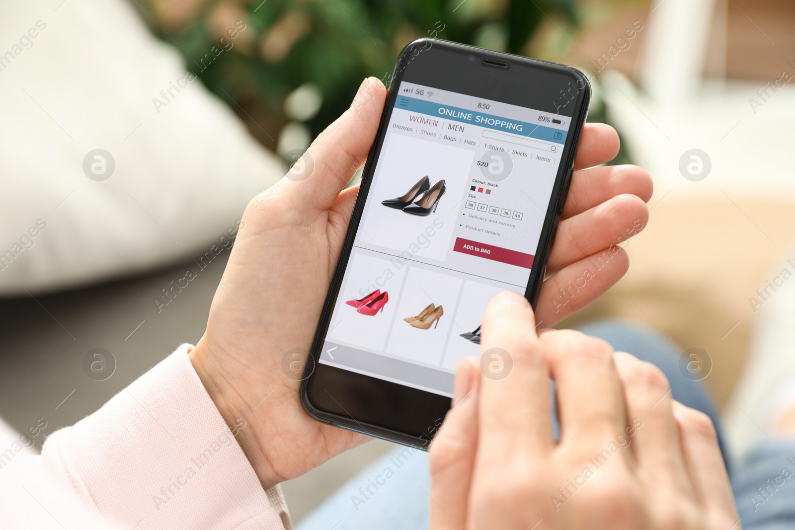 Woman using smartphone for online shopping indoors, closeup Photo of Woman using smartphone for online shopping indoors, closeup