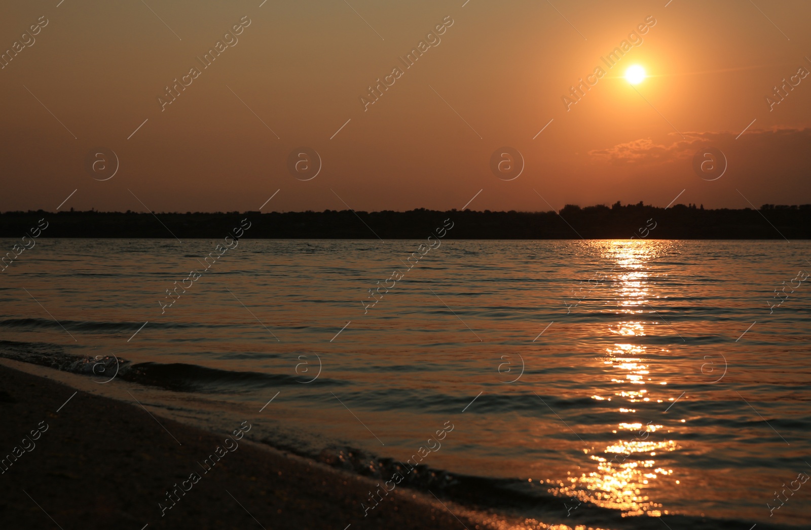 Landscape with beautiful sunset over calm river Photo of Landscape with beautiful sunset over calm river