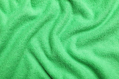 Crumpled light green microfiber cloth as background, closeup Photo of Crumpled light green microfiber cloth as background, closeup