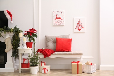 Living room interior with Christmas themed pictures Photo of Living room interior with Christmas themed pictures