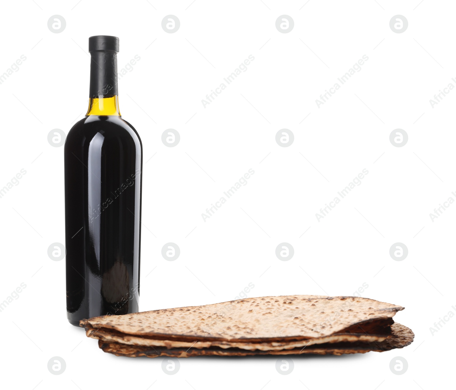 Tasty matzos and wine on white background. Passover (Pesach) celebration Photo of Tasty matzos and wine on white background. Passover (Pesach) celebration
