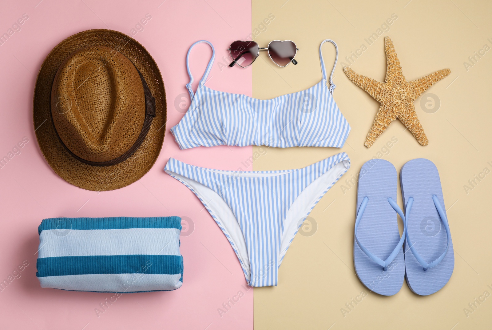 Photo of Flat lay composition with beach objects on color background