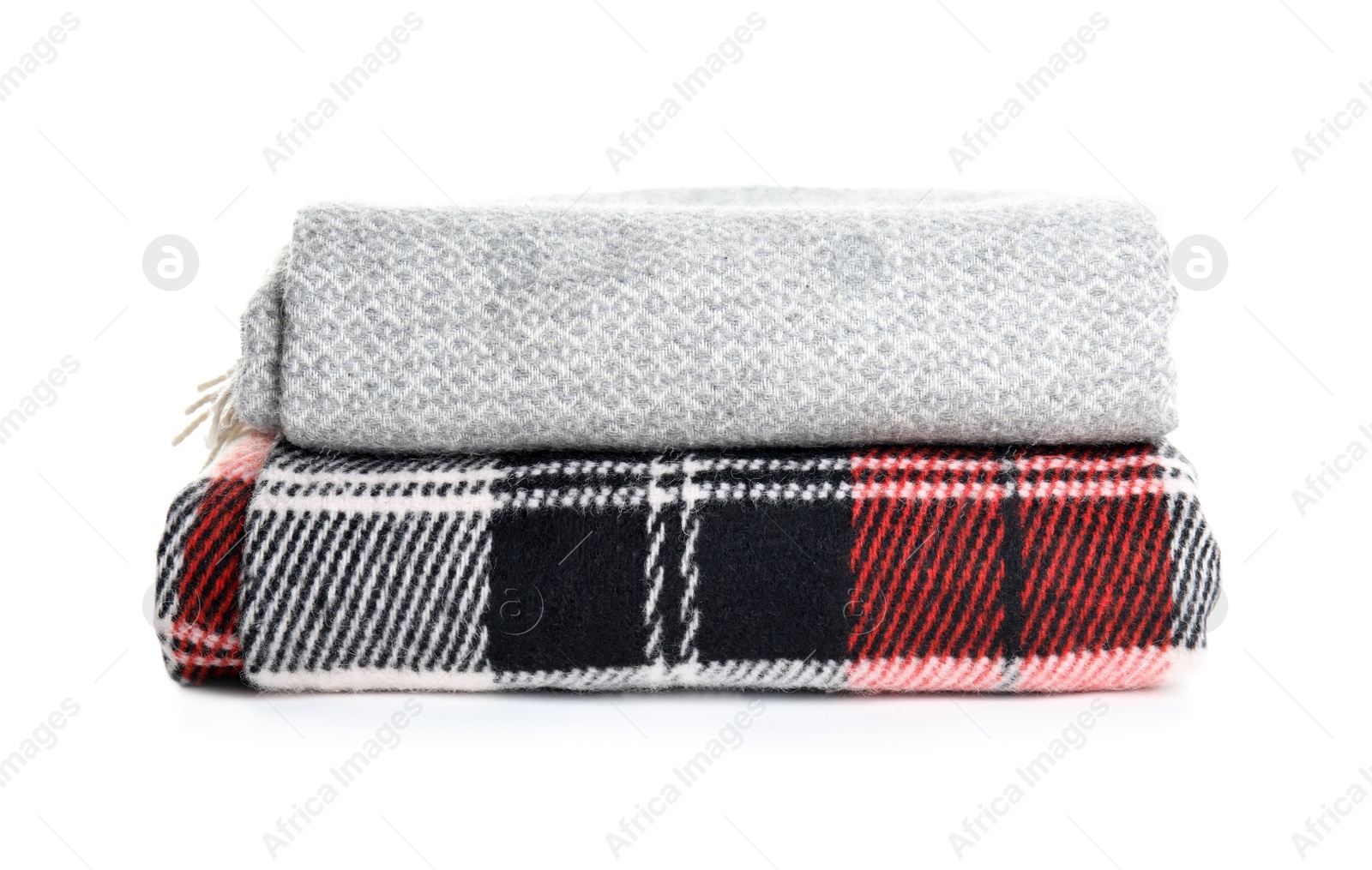 Different stylish soft plaids on white background Photo of Different stylish soft plaids on white background