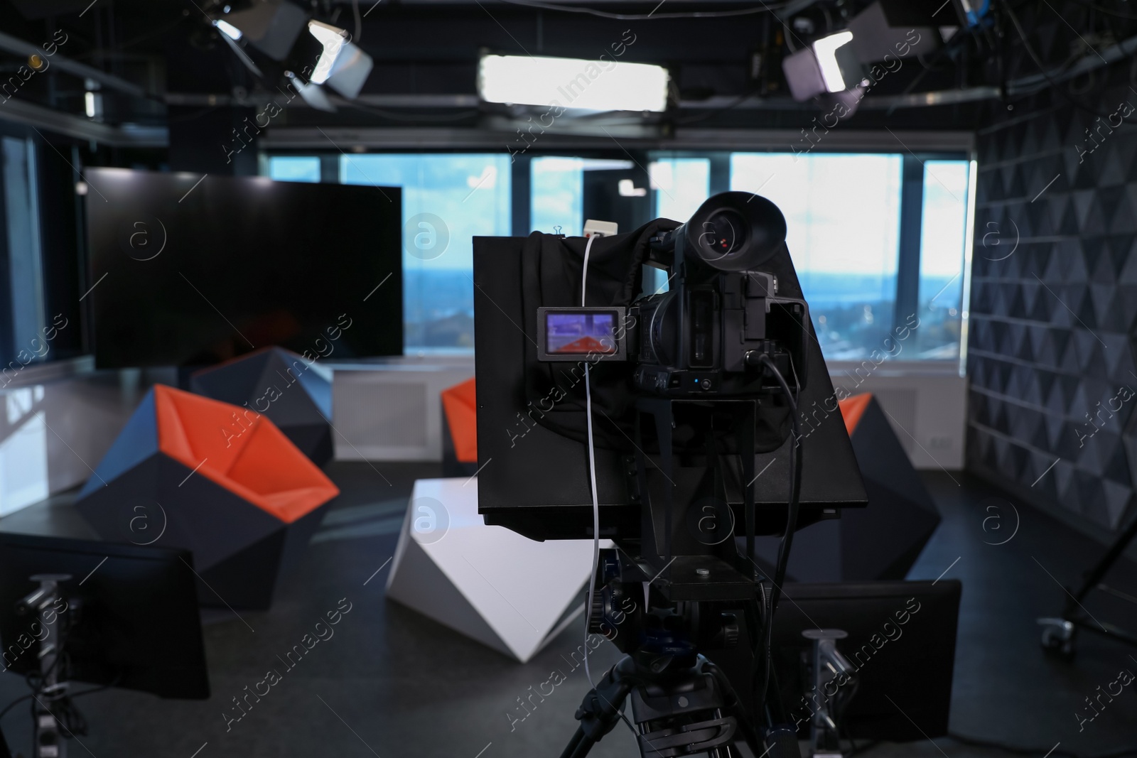 Modern video recording studio with professional equipment, focus on camera Photo of Modern video recording studio with professional equipment, focus on camera