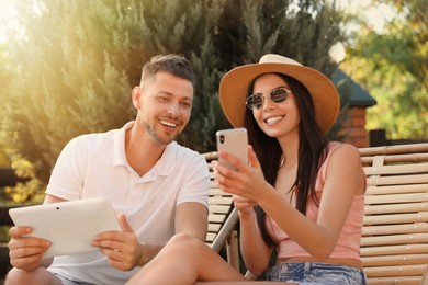 Happy couple spending time together outdoors. Summer vacation Image of Happy couple spending time together outdoors. Summer vacation