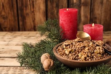 Traditional Christmas slavic dish kutia served on wooden table. Space for text Photo of Traditional Christmas slavic dish kutia served on wooden table. Space for text