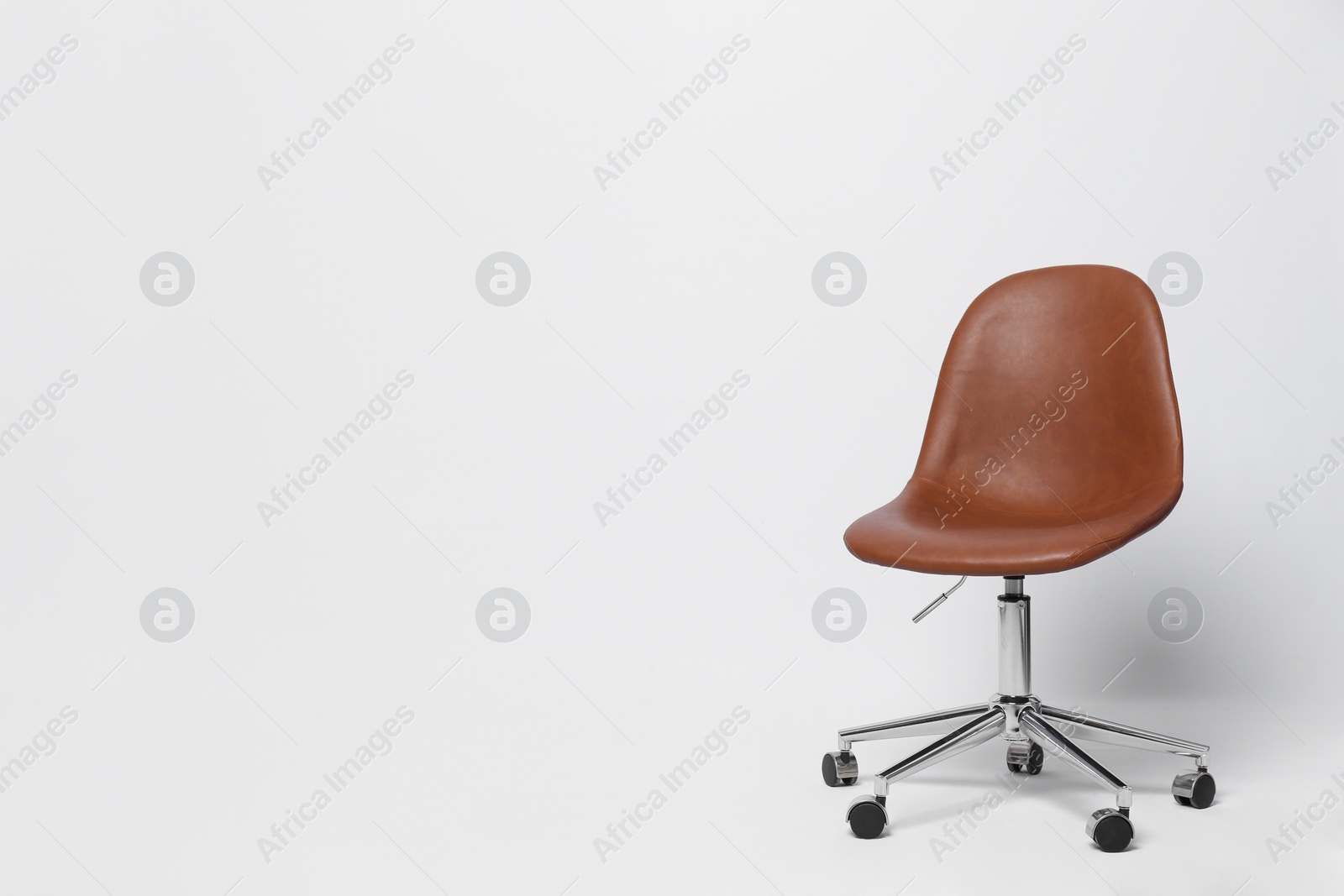 Comfortable office chair on white background, space for text Photo of Comfortable office chair on white background, space for text