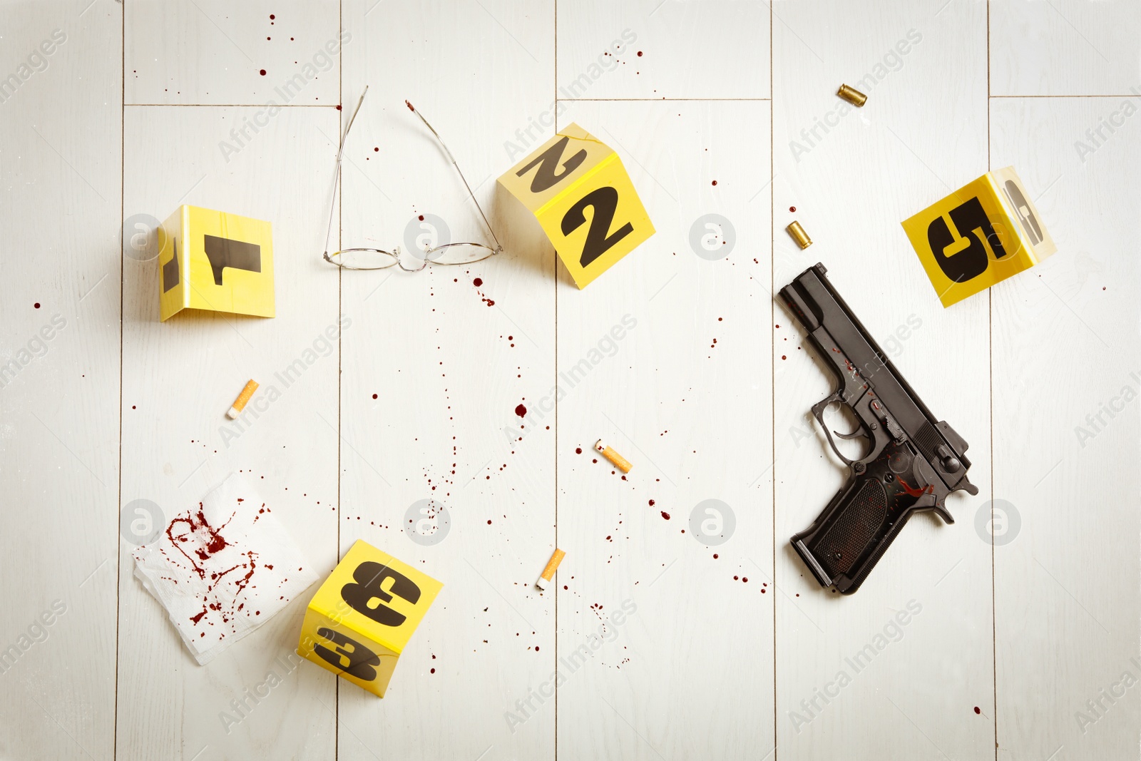 Flat lay composition with evidences on white wooden background. Crime scene Photo of Flat lay composition with evidences on white wooden background. Crime scene