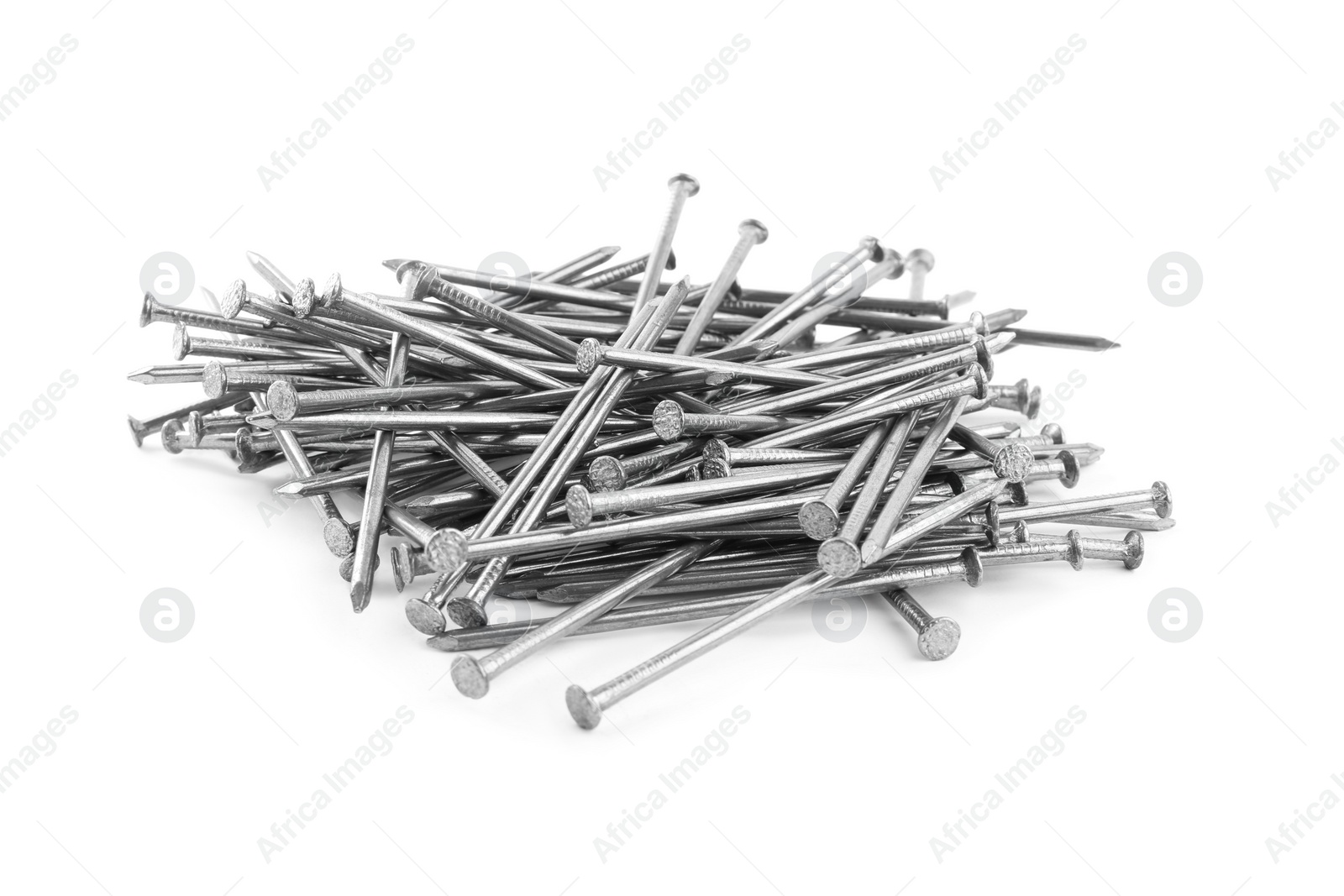 Pile of metal nails on white background Photo of Pile of metal nails on white background
